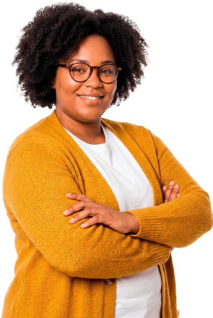 Adult woman with her arms crossed smiling at camera
